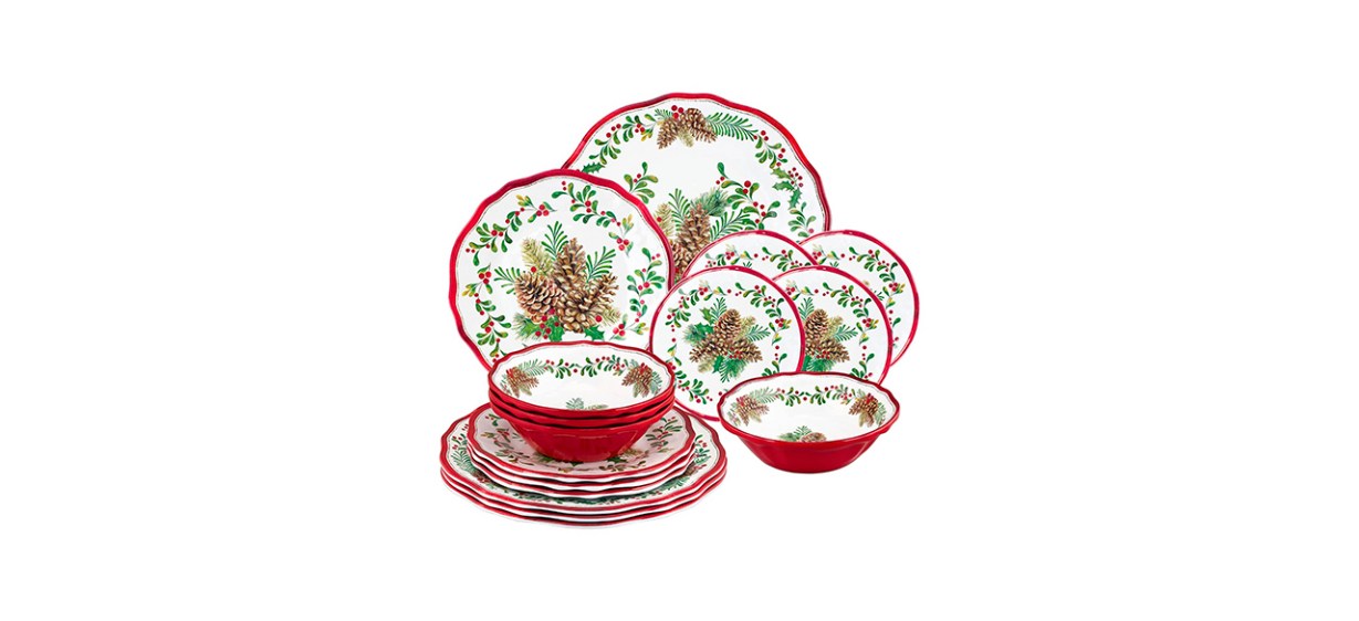 A white and red plate and bowl set with images of pinecones and leaves on them