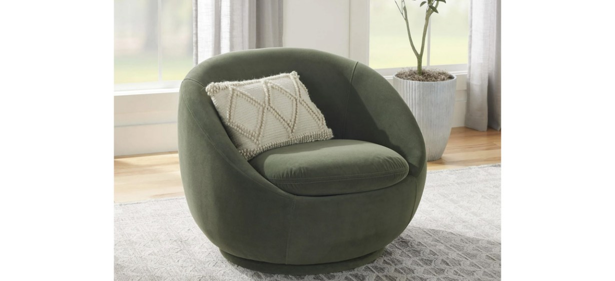 Green Better Homes &amp; Gardens Mira Velvet Swivel Chair with ivory throw pillow