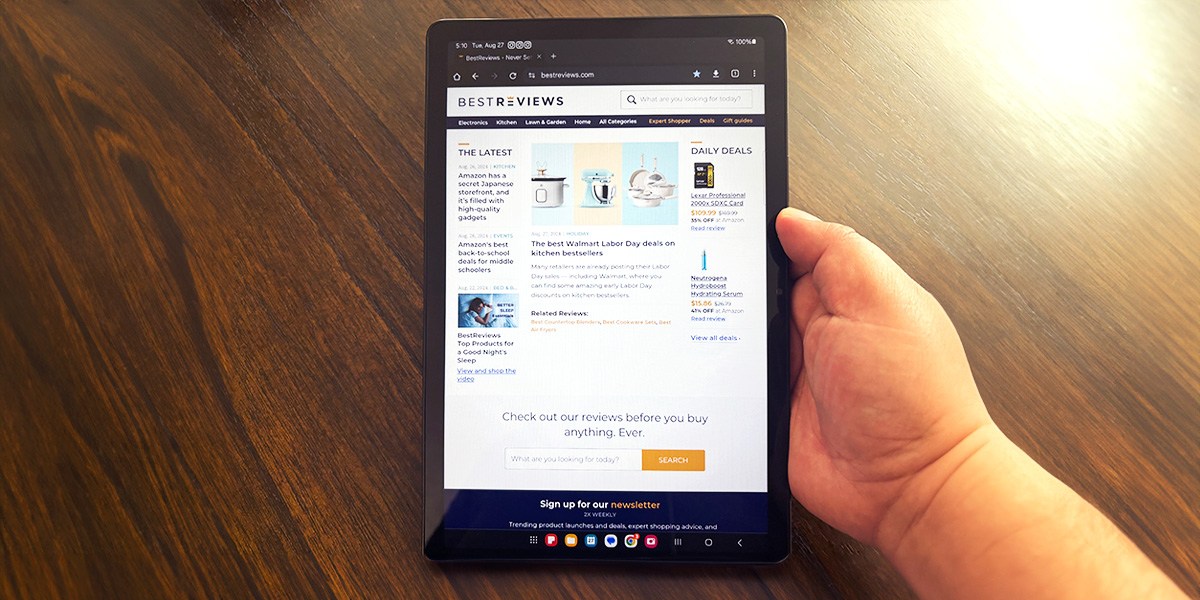 Hand holding Samsung Galaxy Tab A9+